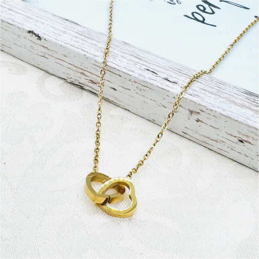 Goldene Doppelherz Halskette aus Titanstahl Anmarii