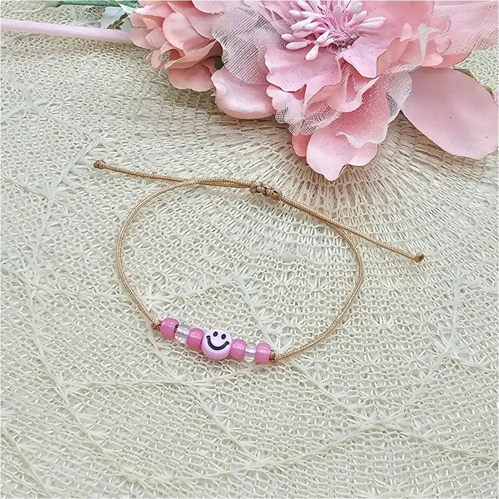 Happy Smiley Makramee Armband rosé inkl. keep Smiling Kärtchen