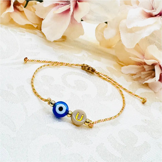 Personalisiertes Evil Eye Glücksbringer Armband beige gold Anmarii