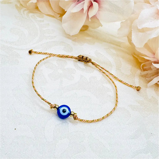 Zartes Evil Eye Glücksbringer Armband beige gold Anmarii